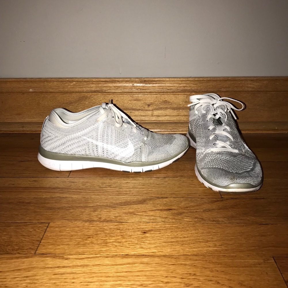 Silver Nike Free 5.0 Knit Sneakers
Size 7.5